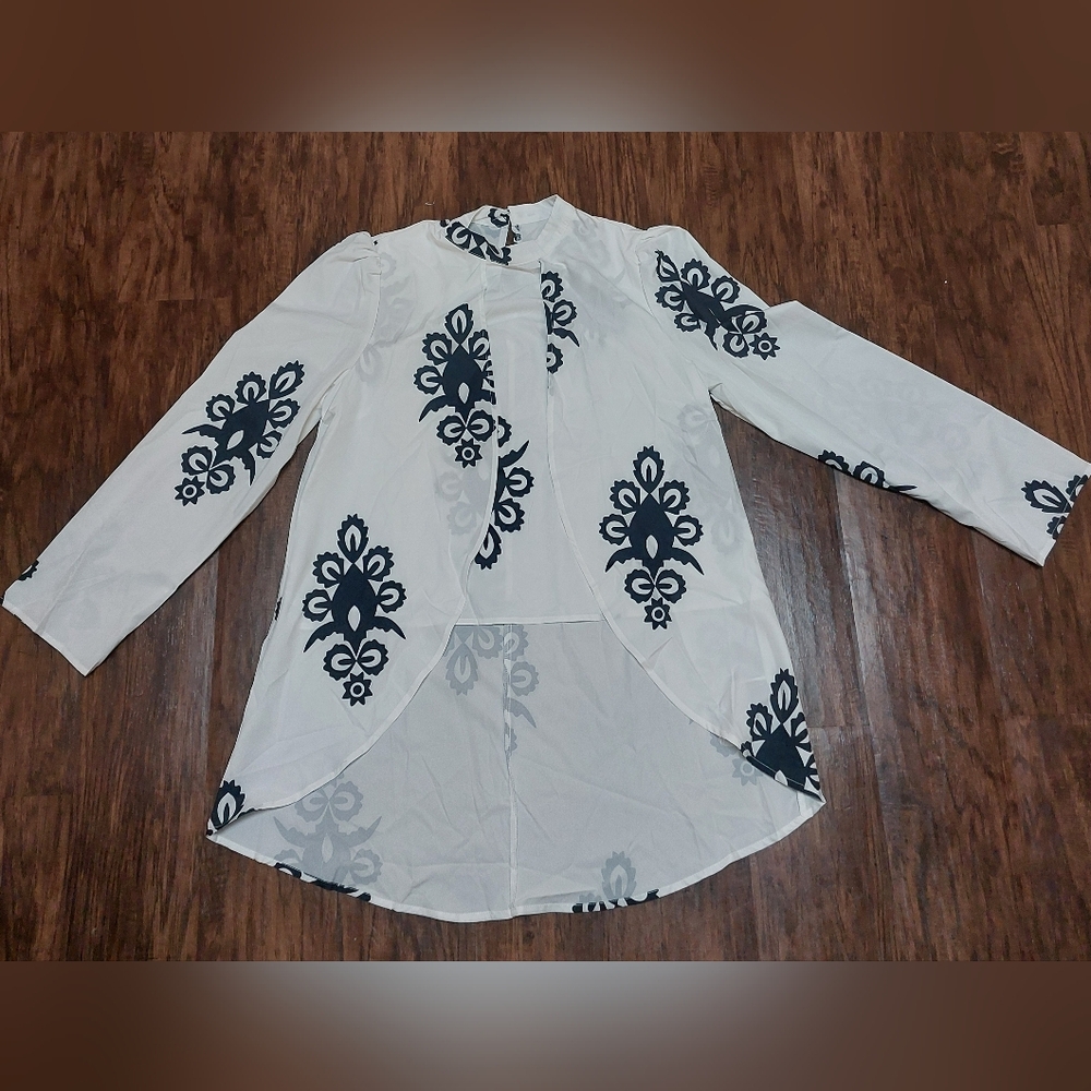 White and Black Patterned Blouse